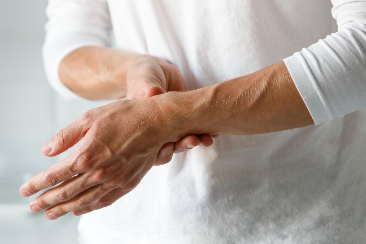 Optimized bigstock Closeup Of Male Arms Holding H 327281701